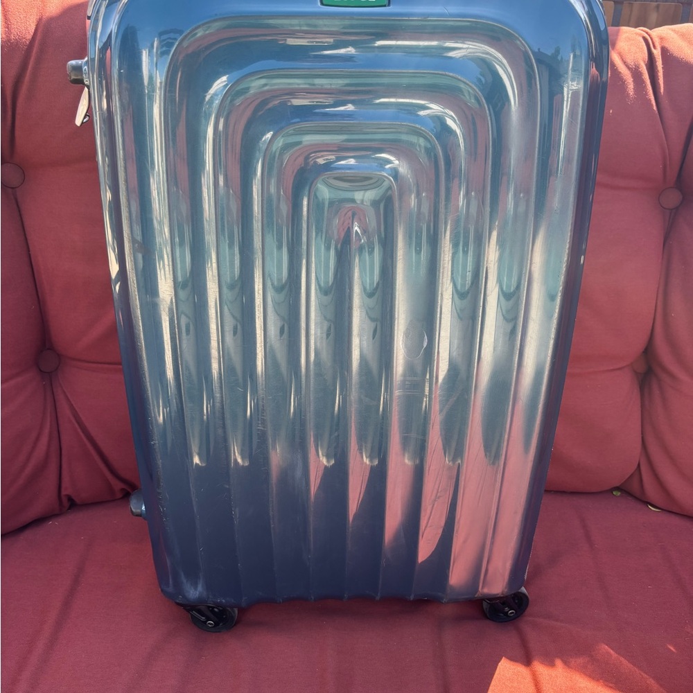 Lojel Wave Suite Case Upright Spinner Luggage